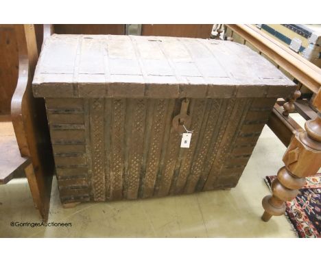   A 19th century Indian iron mounted domed top trunk, length 97cm, depth 58cm, height 70cm
