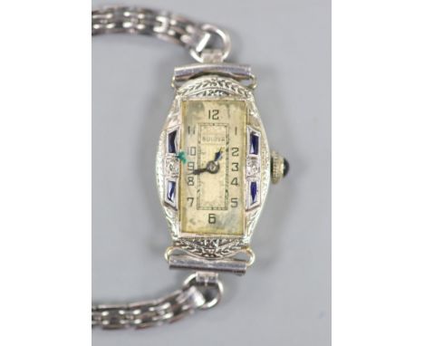   A lady's 1920's/1930's 18k white metal, synthetic sapphire? and diamond set Bulova manual wind cocktail watch, on a stainle