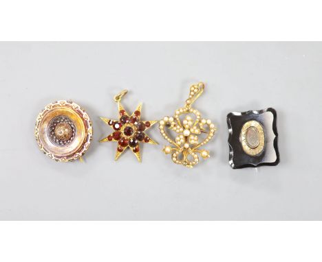   An Edwardian 15ct and seed pearl set drop pendant brooch, overall 48mm, gross 6.4 grams, a Victorian yellow metal target br