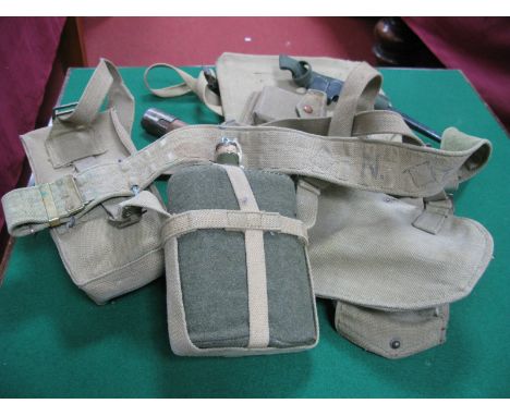 A Quantity of WWII Dated British Army Webbing, including belt/water bottle/map case/en-trenching tool among associated items-