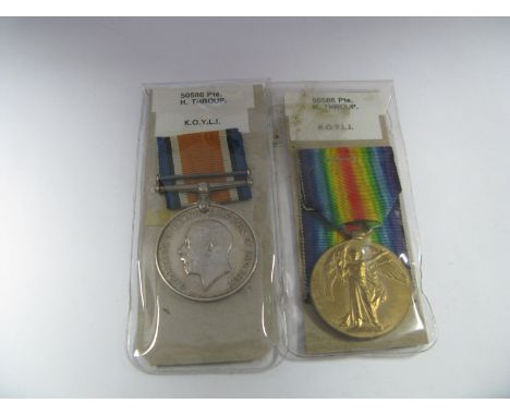 A WWI Medal Duo, comprising War Medal and Victory Medal to 50586 Pte. H. Thraup, Kings Own Yorkshire Light Infantry.