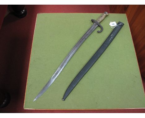 A XIX Century French Sabre Bayonet, dated 1874, with scabbard.