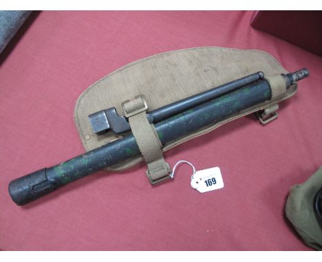 A WWII Pattern Arms Entrenching Tool, in canvas pouch and a 'Pig Sticker' Bayonet in scabbard.