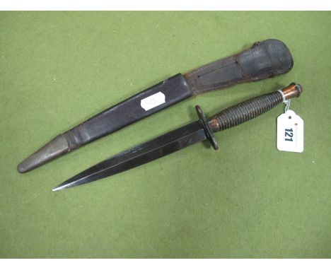 A Fairbairn Sykes 3rd Pattern Style Fighting Knife, with leather scabbard.