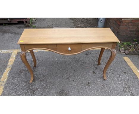 A Coach oak French style console table with a drawer, on cabriole legs, 78cm h x 130cm wLocation: s BlueIf there is no condit
