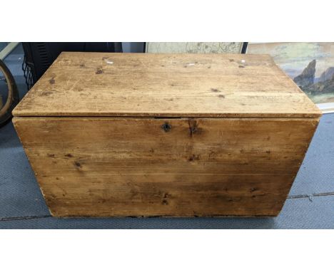 A 19th century pine trunk having a hinged lid and on later feet 52.5cm h x 92cm w Location:If there is no condition report sh
