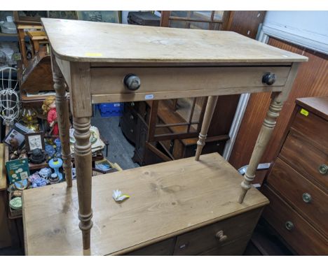 A 20th century pine kitchen table with rounded front corners, single frieze drawer, on ring turned legs 72.5cm x 84cm x 45cm 