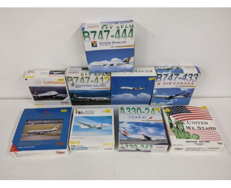 Nine commercial airline plane models by various manufactures Dragon wings, Herpa Wings, Gemini Jets and Tucanoline to include