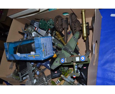 Quantity of toy aeroplanes and a pair of miniature model cannon