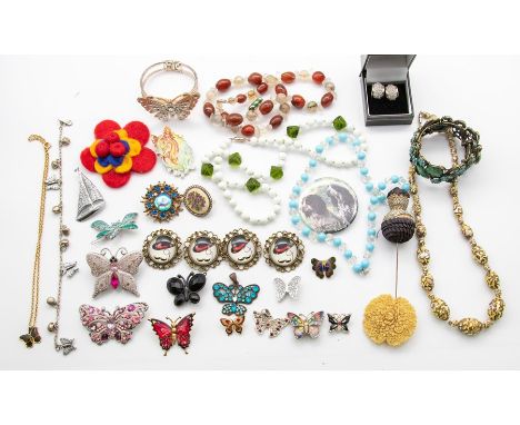 A collection of costume jewellery to include agate and glass bead necklaces, paste set and enamel style brooches, clip earrin