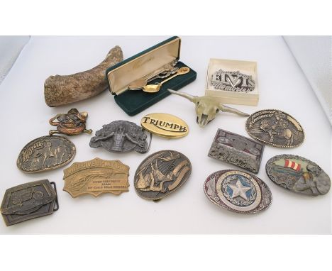 A collection of vintage and modern belt buckles various themes to include: Elvis (Graceland Memories); American Indian, Cowbo