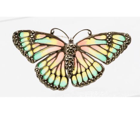 A silver and plique a jour brooch in the form of a butterfly, the wings with green, yellow and orange enamel details, borders