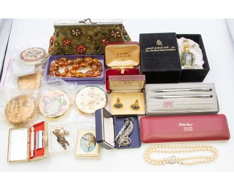 A collection of jewellery and assorted items to include bead and faux pearl necklaces, vinatge brooches, a cased Cross ballpo