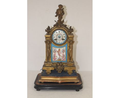 Late 19th Century French bronzed mantel clock, with light blue ceramic inserts, cherub at top, classical ladies each side, Ro