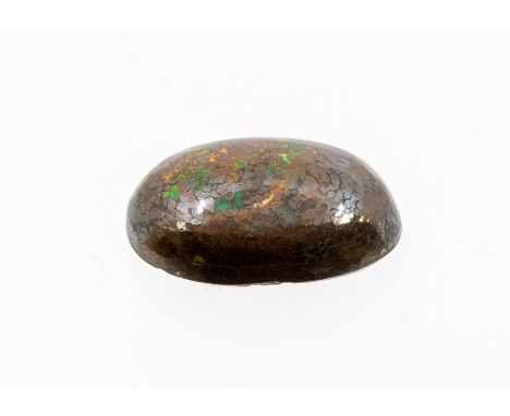 A boulder opal cabochon, with orange and green play of colour, size approx. 18 x 12mm, weight approx. 2.2gms