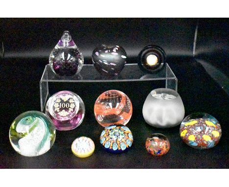 A collection of glass, mid to late 20th Century, paperweights including Caithness examples