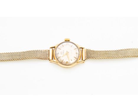 A ladies Movado 9ct gold wristwatch, round dial with baton and number markers, on a 9ct gold mesh strp, total gross weight  a