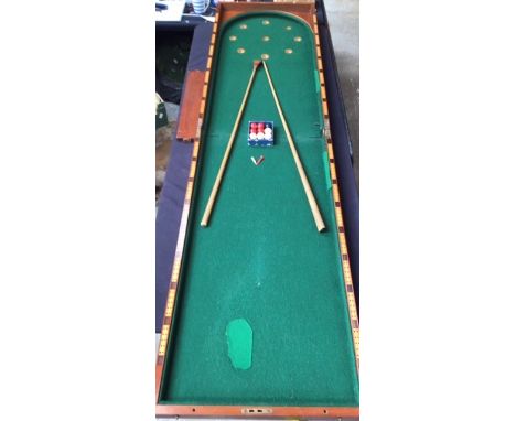 A Victorian Folding Bagatelle in hinged wooden case, with balls, cue,. in playworn condition, folded size 107 x 56 cm, x 15 c