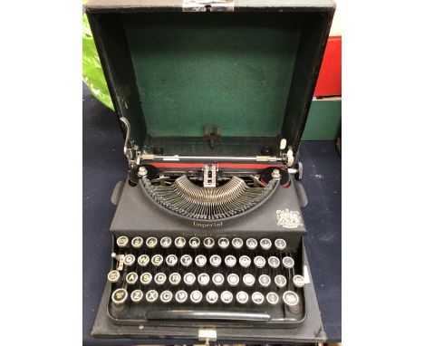 An Imperial early 20th Century "The Good Companion" typewriter in fitted case, with ribbon&nbsp;