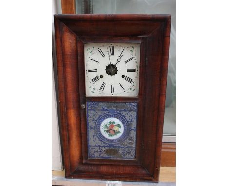 A late 19th Century mahogany wall clock, having two winder holes, white dial and black Roman numerals, 66cm high, 39cm wide