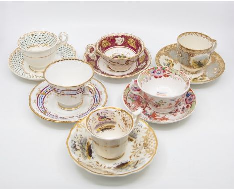 A collection of early to mid 19th Century china cups and saucers, all different Staffordshire patterns with hand painted scen