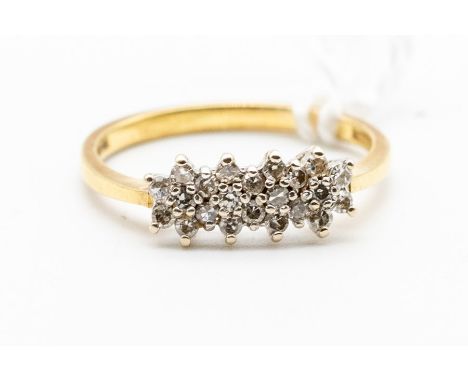 A diamond cluster 18ct gold ring, comprising three diamond set flower cluster details set in a row, setting approx. 15mm, siz