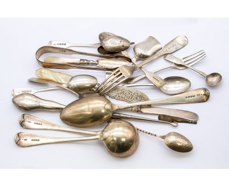 A collection of silver flatware to include: a pair of Old English pattern sauce ladles, by George Adams, London, 1875; a Will