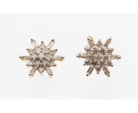 A pair of diamond and 9ct gold flower cluster earrings, comprising a centre of round brilliant cut diamonds with baguette cut