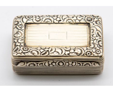 A George III silver snuff box, reeded sides, the cover chased with a foliate border, gilt interior, by Thomas Edwards, London