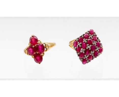 A ruby and 9ct gold dress ring set with four oval rubies, total stone weight approx 2.5carats, size N, along with another rub