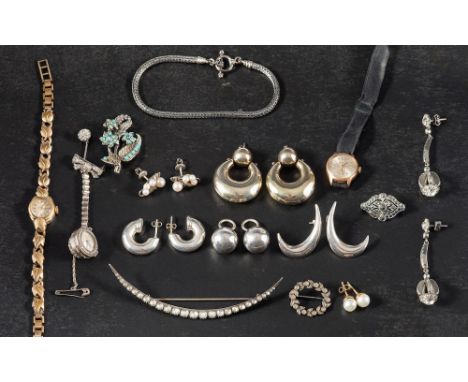 A collection of mainly silver jewellery,: including a paste crescent brooch; a paste wreath brooch; a pair of paste crown dro