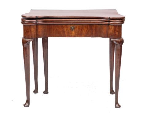 A George II mahogany combined tea and card table, mid 18th century,: the hinged top with projecting circular front corners, o