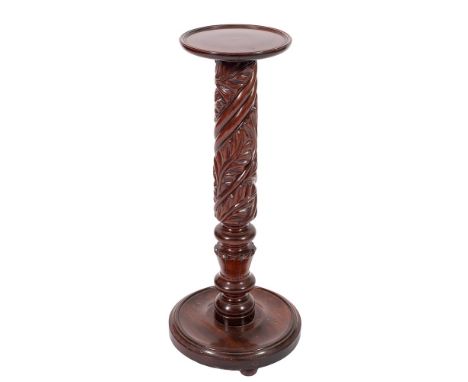 A Victorian mahogany vase or lamp stand, last quarter 19th century and possibly adapted,: the circular top with moulded outer