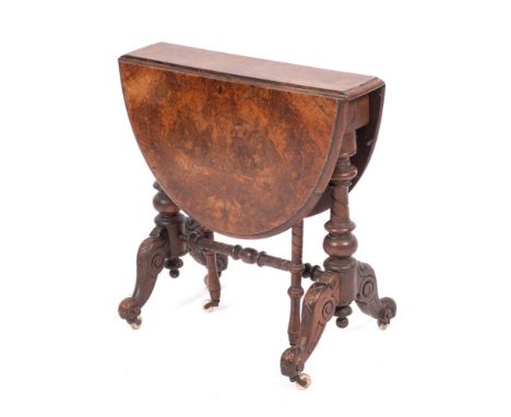 A Victorian walnut Sutherland occasional table, circa 1870,: the oval top with twin drop leaves, on turned supports to splaye