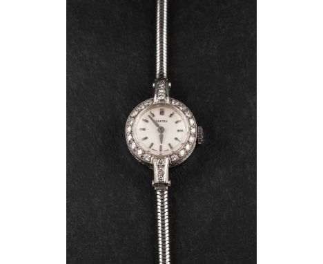 A 18ct gold  'Vertex' wristwatch,: the white enamel dial with baton markers, spade hands and single-cut diamond surround, tot