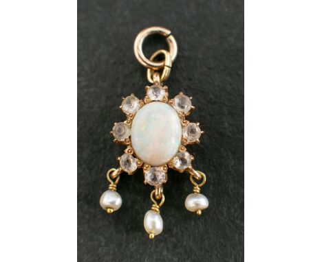 A cabochon-cut opal, white topaz and seed pearl pendant,: estimated opal weight ca. 0.65cts, length ca. 2.8cms, total weight 