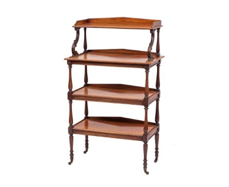 A George IV mahogany four tier whatnot, circa 1825,: the smaller top shelf with three-quarter gallery with pediment back, on 