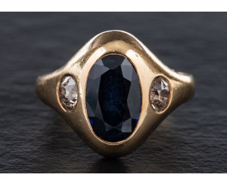 A sapphire and old-cut diamond three-stone ring,: estimated total diamond weight ca. 0.35cts, J-K colour, SI2-P1, length of r