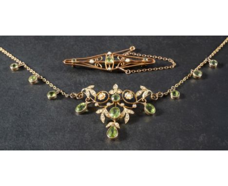 A peridot and seed pearl Art Nouveau style fringe necklace,: stamped '9C', length ca. 51cm; together with an openwork peridot