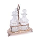 An electro-plated three-division decanter stand: of trefoil outline, with gadrooned border,