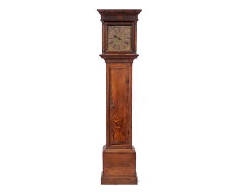 Stringer, Nantwich, an oak longcase clock: the thirty-hour duration movement striking the hours on a bell (missing) with an o