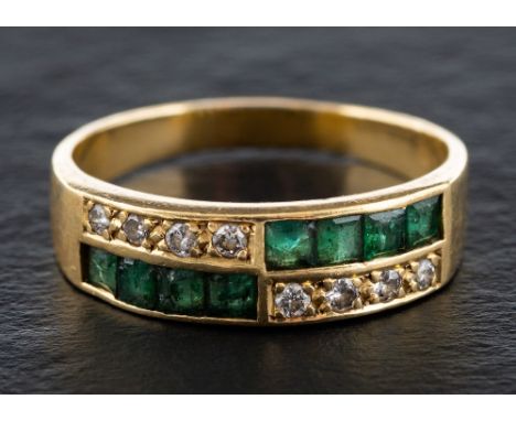 A two-row, emerald and round brilliant-cut diamond ring,: total estimated diamond weight ca.0.08cts, stamped '750, length of 