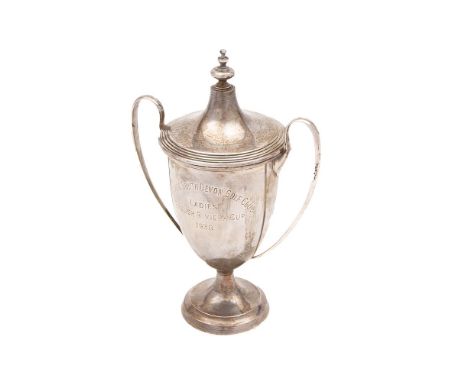 A George VI silver twin handled trophy cup and cover, maker Adie Brothers Ltd, Birmingham 1937: inscribed, the lift-off cover