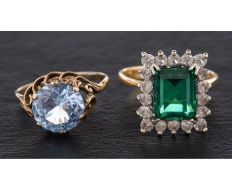Two synthetic spinel rings,: a ring with a step-cut green synthetic spinel, length of ring head ca. 1.6cm, ring size P; a rin