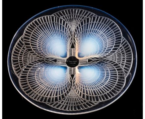 A Lalique shallow dish 'Coquilles': of circular form, the exterior moulded with a series of radiating shells, wheel cut R. La