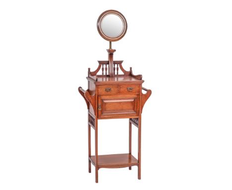 A Victorian mahogany dressing stand in Arts and Crafts taste, late 19th century,: with an adjustable circular shaving mirror 