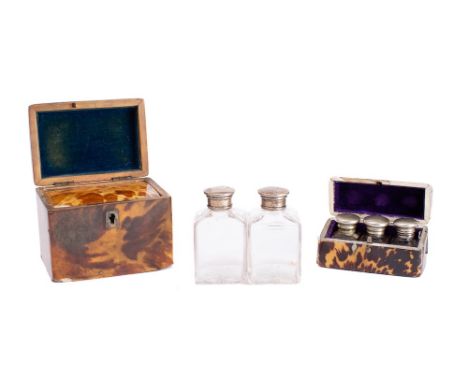 A 19th century blonde tortoiseshell tea caddy: of rectangular outline, the hinged domed lid enclosing a lidded interior, 12cm