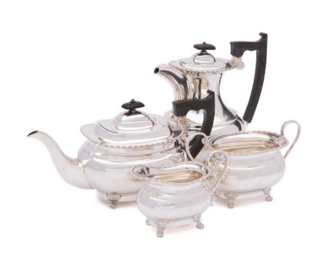 An Elizabeth II silver four-piece tea and coffee set, maker Viners Ltd, Sheffield, 1956/57: of barge-shaped outline, with bob