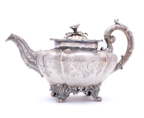 A William IV silver teapot, maker Edward, Edward Jnr, John & William Barnard, London, 1835: crested, of squat melon-shaped ou