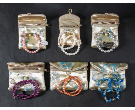 A group of dyed, freshwater pearl jewellery from the 'Honora Collection',: including two necklaces and six bracelets, the cla